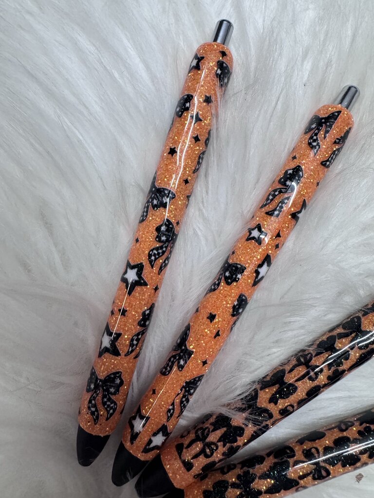 GEL PENS ORANGE GLITTER WITH BOW PRINTS