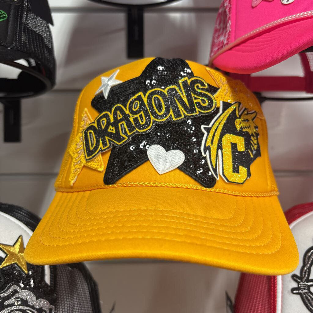 Yellow Otto Chico dragons hat w lettering and dragon