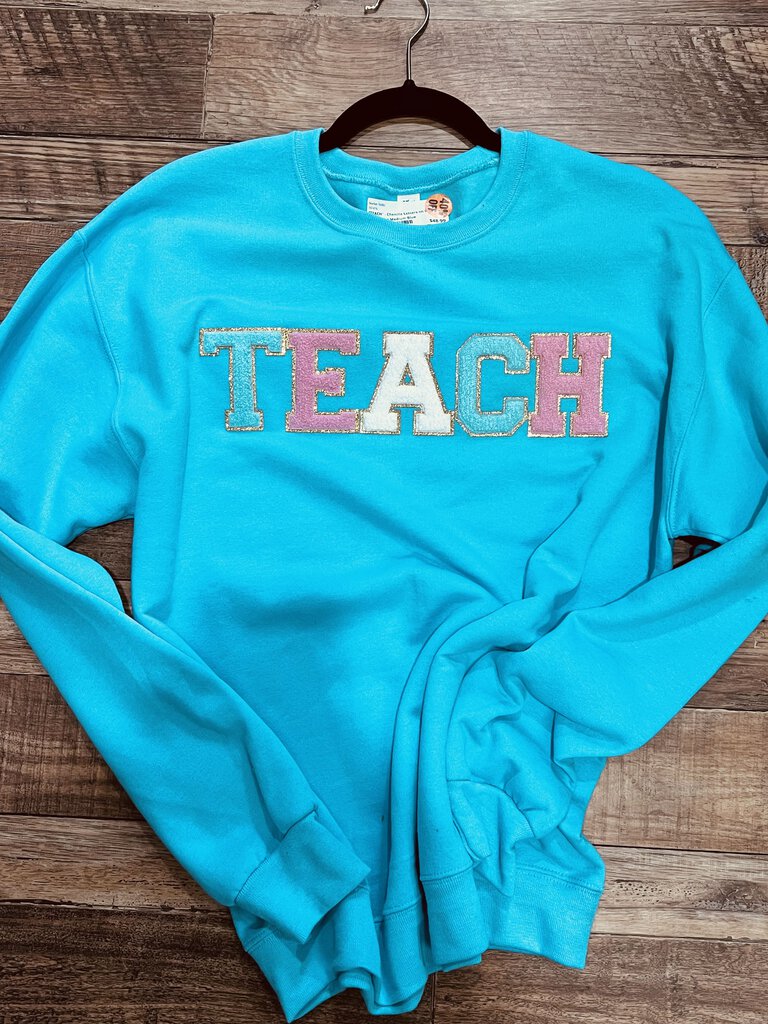 "TEACH" - Chenille Letters on Blue Sweatshirt