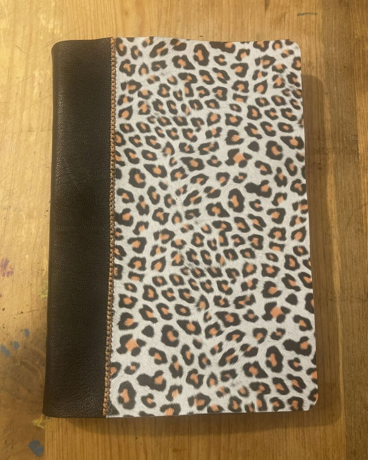 Leopard Print Sheepskin and black goatskin Thomas Nelson KJV bible rebind