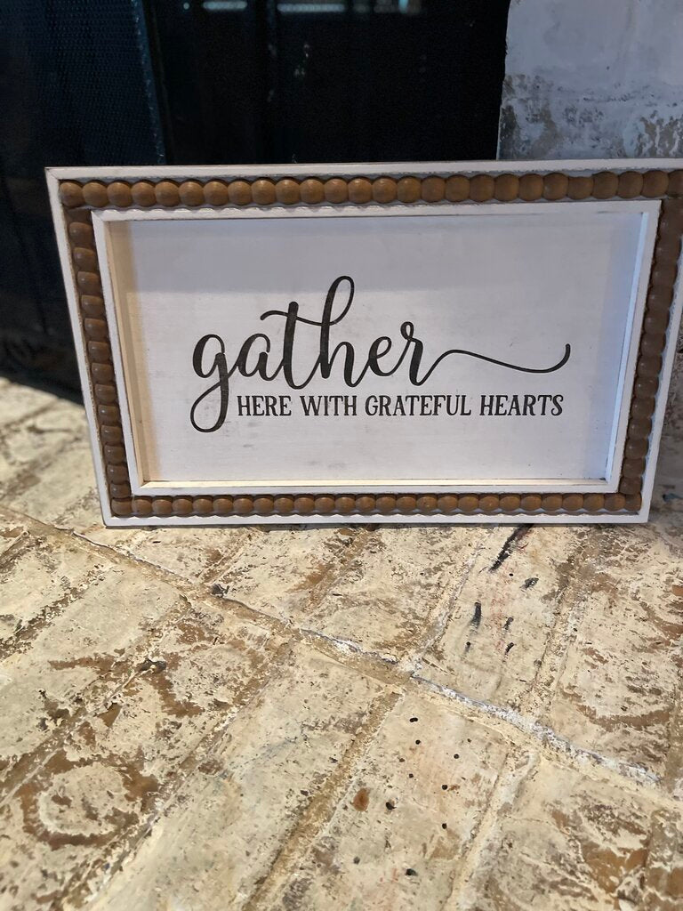 White rectangle gather sign