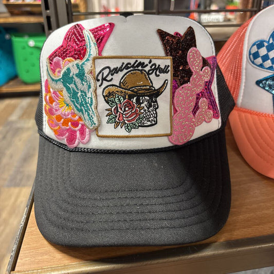 Black with white front Raising hell skeleton with hat patched hat