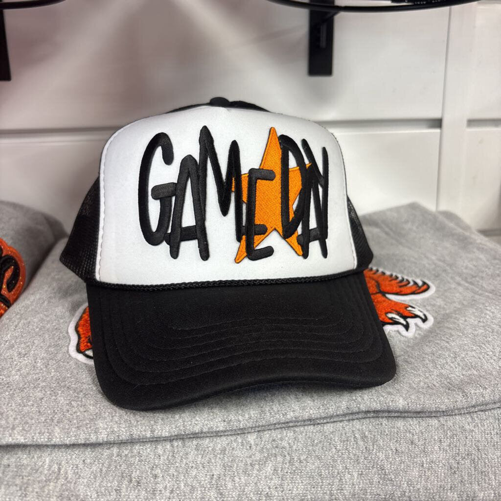 Black w white front OTTO trucker with Game day w orange star patch