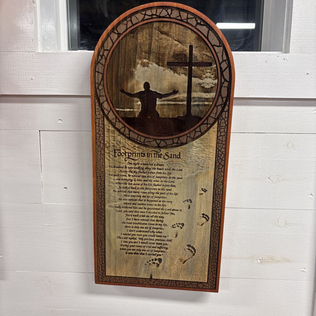 Footprints in the sand engraved sign