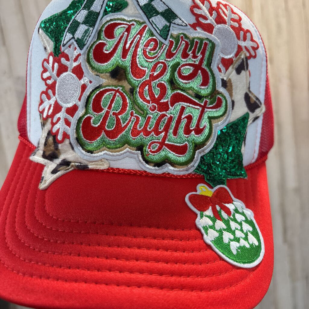 Red and white OTTO with Merry and Bright patche, leopard stars and green stars and bow.