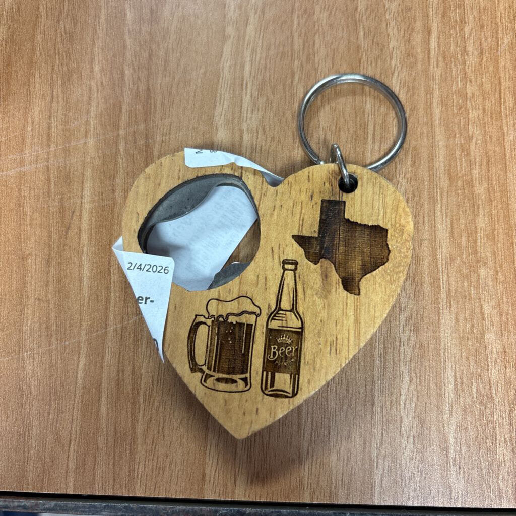 Heart shaped keychain bottle opener- beer never broke my heart