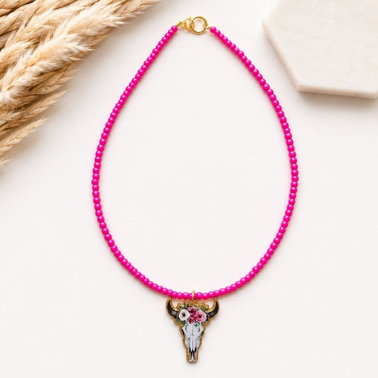 Necklace- bright pink seed bead with cow skull