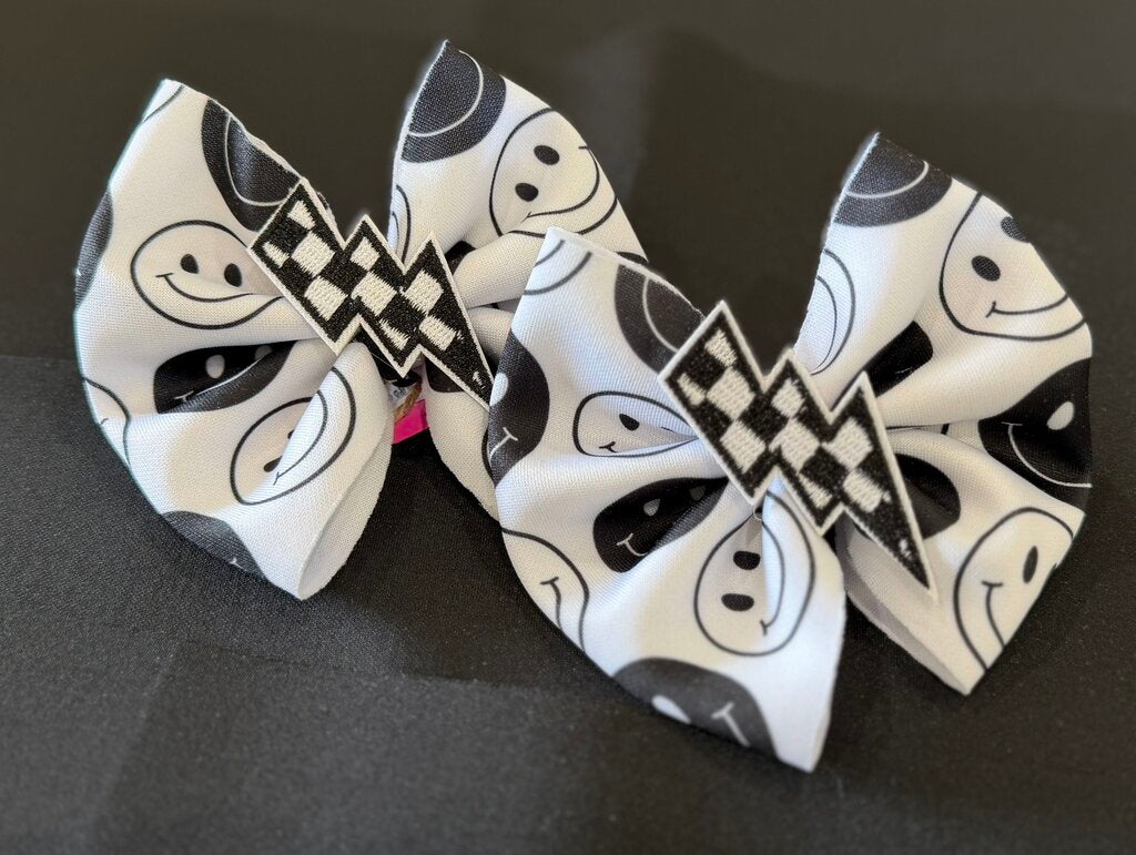 Black & white smiley piggies with chkrd bolt