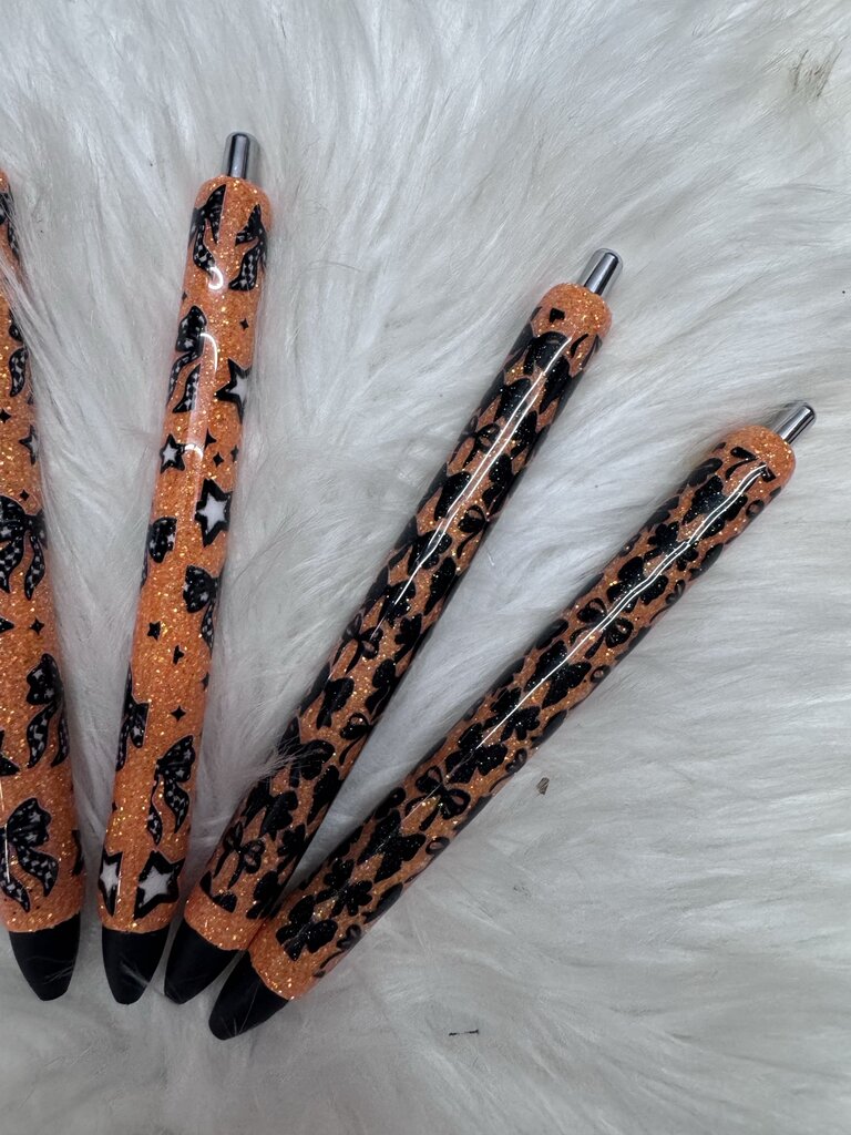 GEL PENS ORANGE GLITTER WITH BOW PRINTS